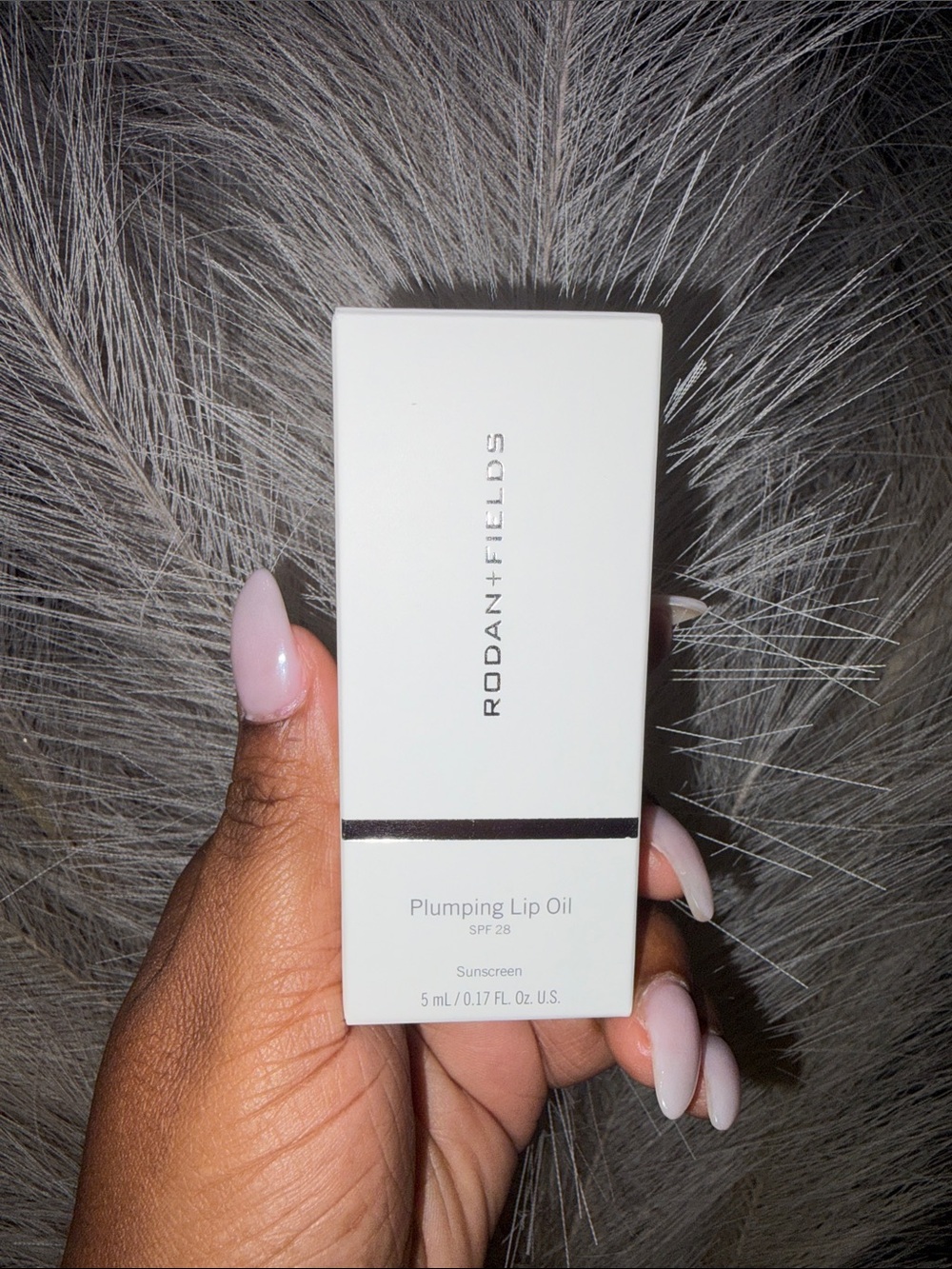 Rodan + Fields Plumping Lip Oil in White Packaging